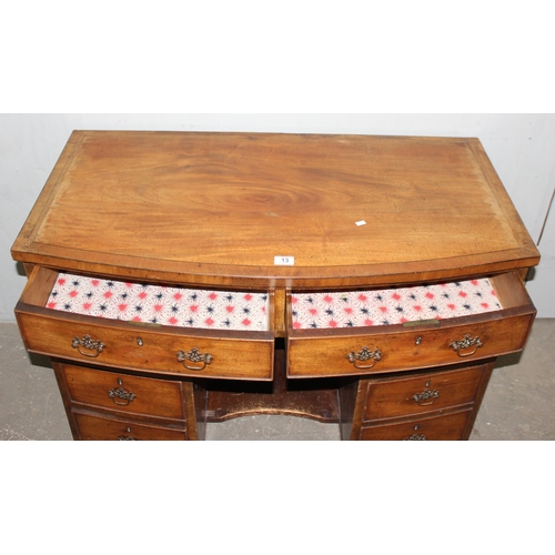 13 - A 19th century mahogany kneehole desk of 8 drawer construction with Georgian style brass handles, ap... 