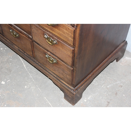 14 - A late 18th or early 19th century George III period mahogany bureau, the 9 drawers of unusual constr... 