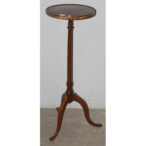 15 - An antique mahogany plant or jardinière stand standing on tripod base and with unusual specimen wood... 