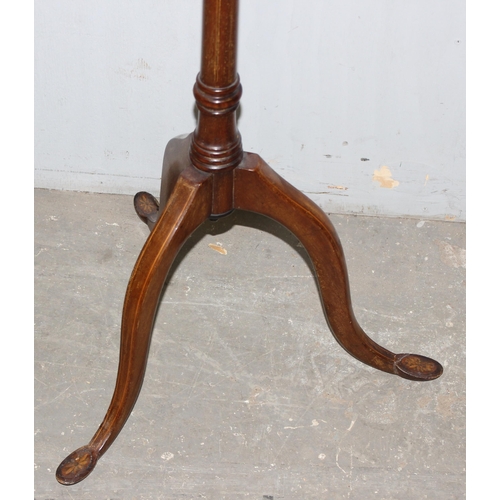 15 - An antique mahogany plant or jardinière stand standing on tripod base and with unusual specimen wood... 