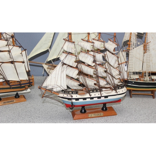 6 assorted wooden model boats or galleons