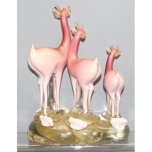 1618 - Murano/ Italian Glass, a large glass sculpture of a trio of pink deer on glass base, with gold leaf ... 