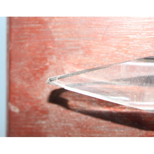 1622 - A Whitefriars glass frigger work model of a sword with a drawn clear crystal blade rising to a clear... 