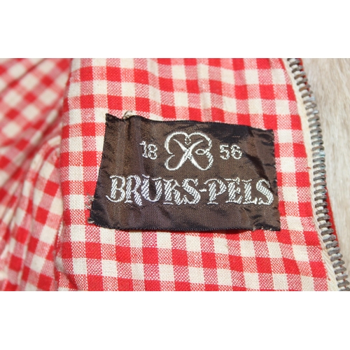 201 - Retro child's goat skin jacket with gingham lining by Bruks-pels