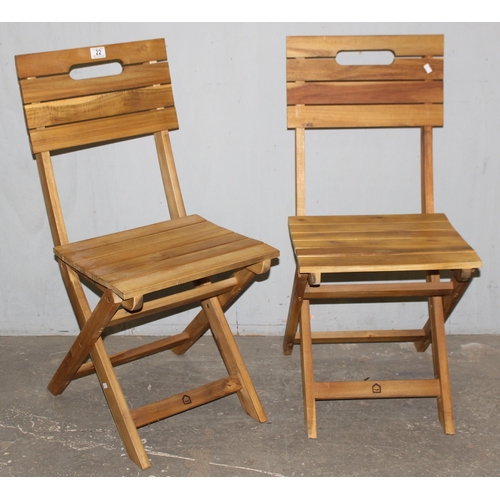 22 - 2 modern folding wooden chairs, each approx 88cm tall