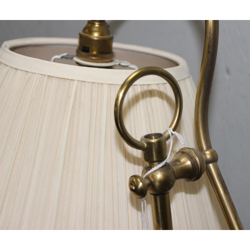 242 - A brass standard lamp with adjustable shade by Christopher Wray, approx 160cm tall