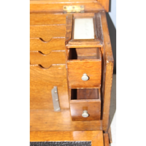 273 - A superb quality antique oak desktop stationary box, with various compartments and leather slope, ap... 