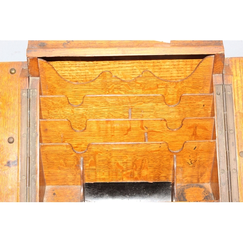 276 - An early 20th century oak desktop correspondence box and a further antique wooden box (2)