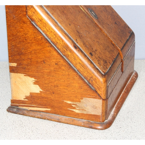 276 - An early 20th century oak desktop correspondence box and a further antique wooden box (2)