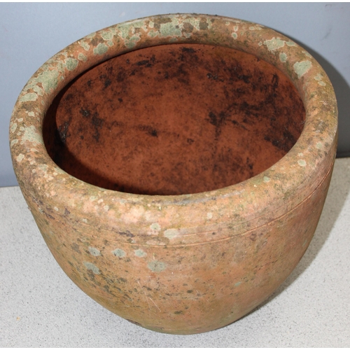 301 - A large weathered terracotta garden planter, approx 36cm tall x 36cm in diameter