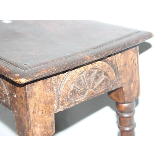 7 - An antique carved oak joint or coffin stool, 1 of 2 very similar in the sale, approx 46cm wide x 28c... 