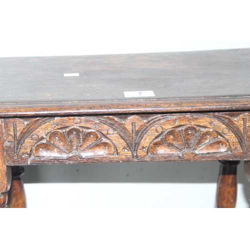 7 - An antique carved oak joint or coffin stool, 1 of 2 very similar in the sale, approx 46cm wide x 28c... 