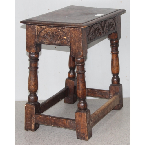 7 - An antique carved oak joint or coffin stool, 1 of 2 very similar in the sale, approx 46cm wide x 28c... 