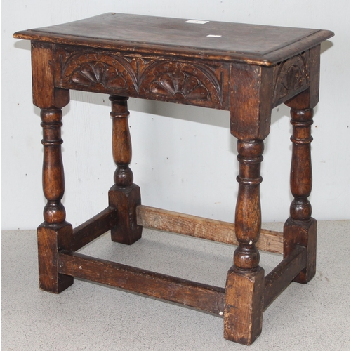 7 - An antique carved oak joint or coffin stool, 1 of 2 very similar in the sale, approx 46cm wide x 28c... 