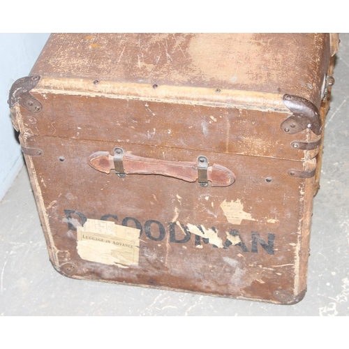 74 - A large vintage flat topped steamer trunk with canvas covering and wooden struts, approx 92cm wide x... 