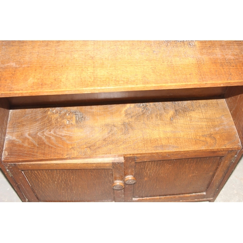 77 - Vintage oak bookcase with cupboard base, approx 76cm wide x 23cm deep x 112cm tall