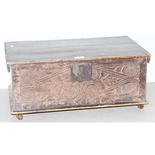 8 - An antique carved oak bible box, likely 18th century or earlier, with ironwork fittings, approx 59cm... 