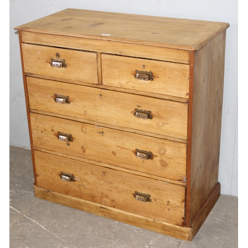 83 - An antique stripped pine 2 over 3 chest of drawers with brass cup handles, approx 95cm wide x 48cm d... 