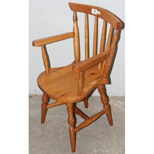 95 - A small vintage child's pine farmhouse Windsor chair, approx 40cm wide x 65cm tall