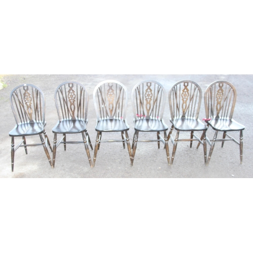 97 - A set of 6 vintage wheel back country kitchen chairs