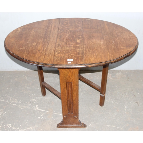 99 - An Art Deco period oak drop leaf table, approx 108cm wide x 77cm deep x 74cm tall