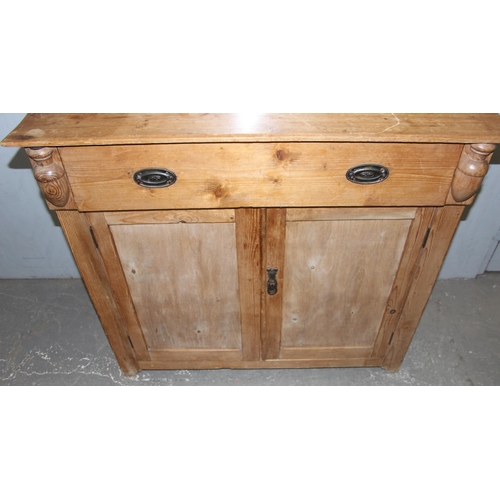 125 - An antique pine dresser or chiffonier, single frieze drawer over cupboard with mirror backed display... 