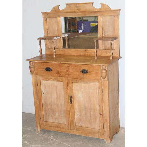 125 - An antique pine dresser or chiffonier, single frieze drawer over cupboard with mirror backed display... 