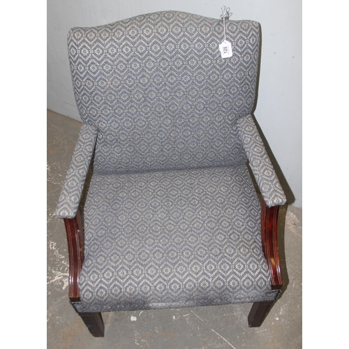 128 - A Georgian style wide armchair with blue upholstery, approx 105cm tall