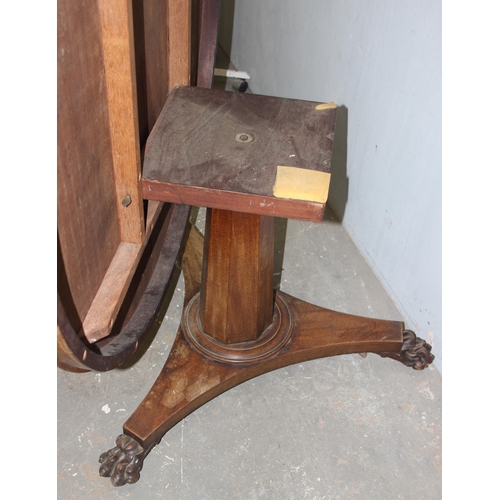 132 - A Victorian tilt topped mahogany breakfast table with pedestal base and lion paw feet, approx 120cm ... 