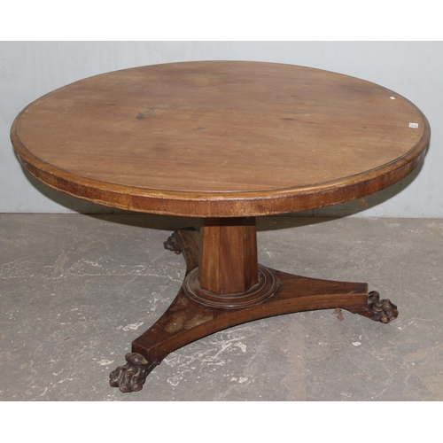 132 - A Victorian tilt topped mahogany breakfast table with pedestal base and lion paw feet, approx 120cm ... 