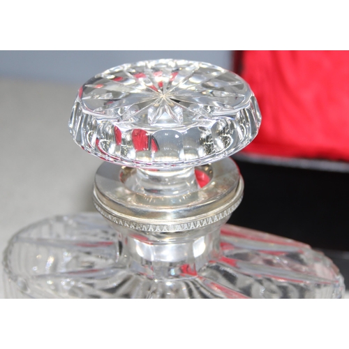 1656 - A vintage boxed crystal and silver plated decanter, approx 22cm tall