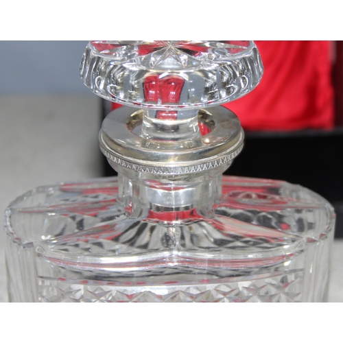 1656 - A vintage boxed crystal and silver plated decanter, approx 22cm tall