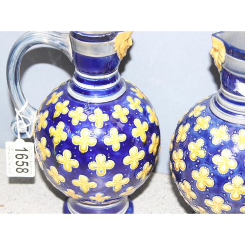 1658 - A matched pair of Minton Majolica water jugs, footed bulbous form, decorated with yellow quatrefoils... 