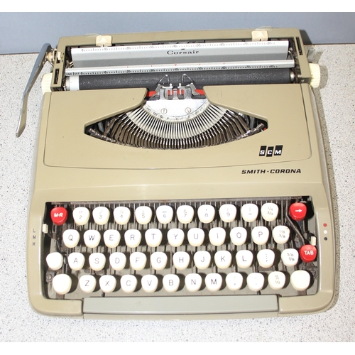 656 - Vintage Smith-Corona typewriter in case