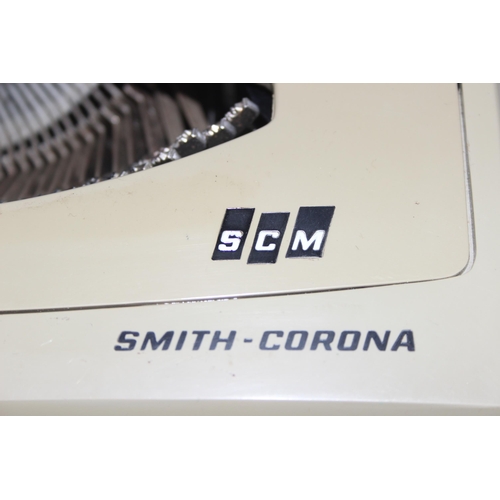 656 - Vintage Smith-Corona typewriter in case