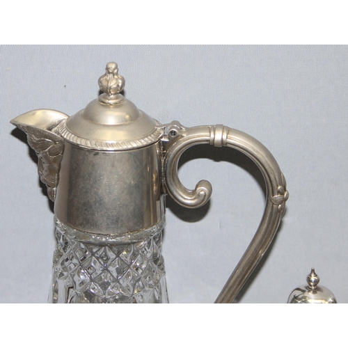 1020 - Vintage glass and silver plated claret jug with hinged lid, a three piece cut glass silver topped cr... 