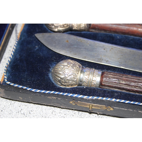 1024 - George Wilson carving set with antler and silver-plated handles, and boxed set of silver-plated teas... 