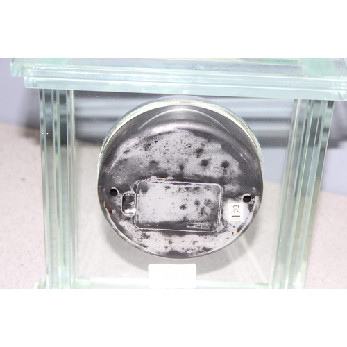 1315 - Large silver bezel quartz mantel clock in clear glass stepped case., approx 23cm x 25cm and a vintag... 