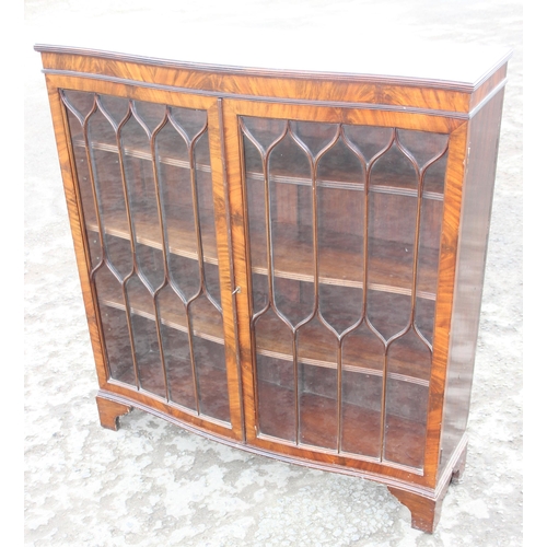 135 - A vintage mahogany astral glazed bookcase, approx 107cm wide x 32cm deep x 116cm tall