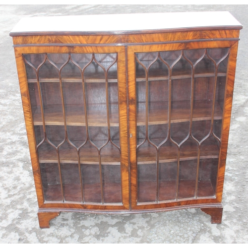 135 - A vintage mahogany astral glazed bookcase, approx 107cm wide x 32cm deep x 116cm tall