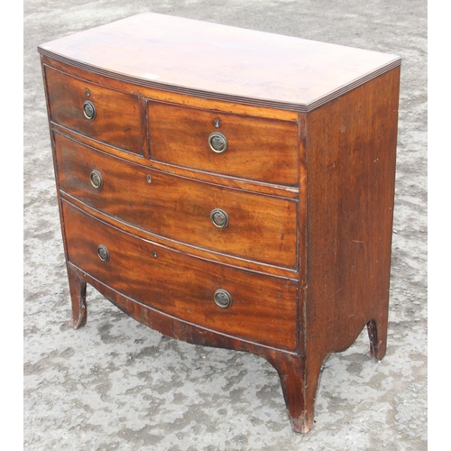 136 - An antique mahogany 2/2 bow fronted chest of drawers, approx 88cm wide x 49cm deep x 90cm tall