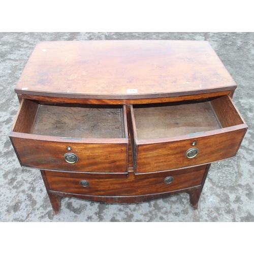 136 - An antique mahogany 2/2 bow fronted chest of drawers, approx 88cm wide x 49cm deep x 90cm tall