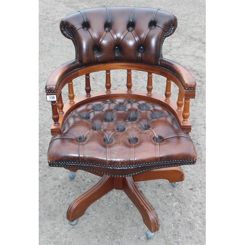 139 - Vintage deep buttoned brown Chesterfield leather or faux leather captain's chair or office swivel ch... 