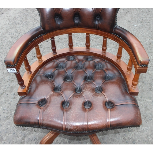 139 - Vintage deep buttoned brown Chesterfield leather or faux leather captain's chair or office swivel ch... 