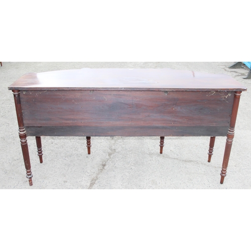 142 - A 19th century mahogany sideboard with 2 cupboards flanking 2 central drawers, approx 186cm W x 66cm... 