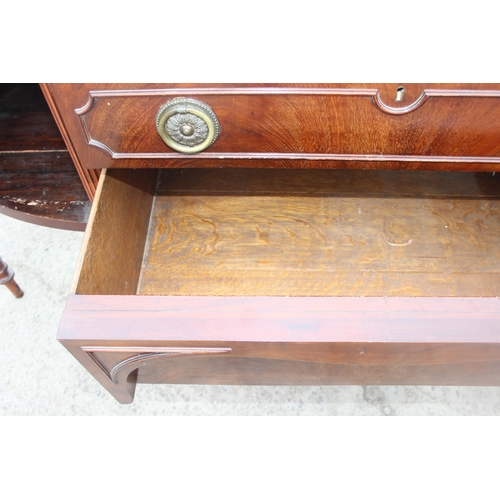 142 - A 19th century mahogany sideboard with 2 cupboards flanking 2 central drawers, approx 186cm W x 66cm... 