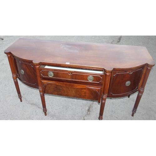 142 - A 19th century mahogany sideboard with 2 cupboards flanking 2 central drawers, approx 186cm W x 66cm... 