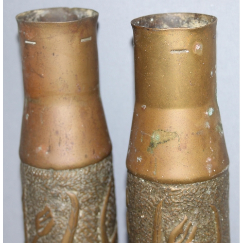 1427 - Pair of WW2 trench art shell vases with Art Nouveau floral design, approx 23cm tall