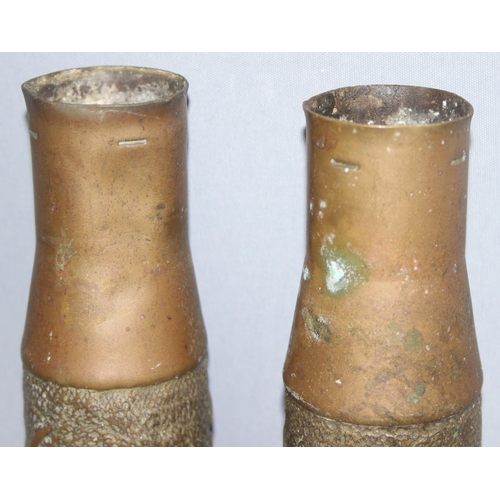 1427 - Pair of WW2 trench art shell vases with Art Nouveau floral design, approx 23cm tall