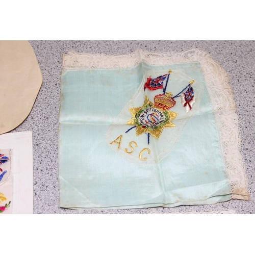 1429 - A WWI period silk postcard and 3 embroidered silk handkerchiefs, 2 with ASC embroidery